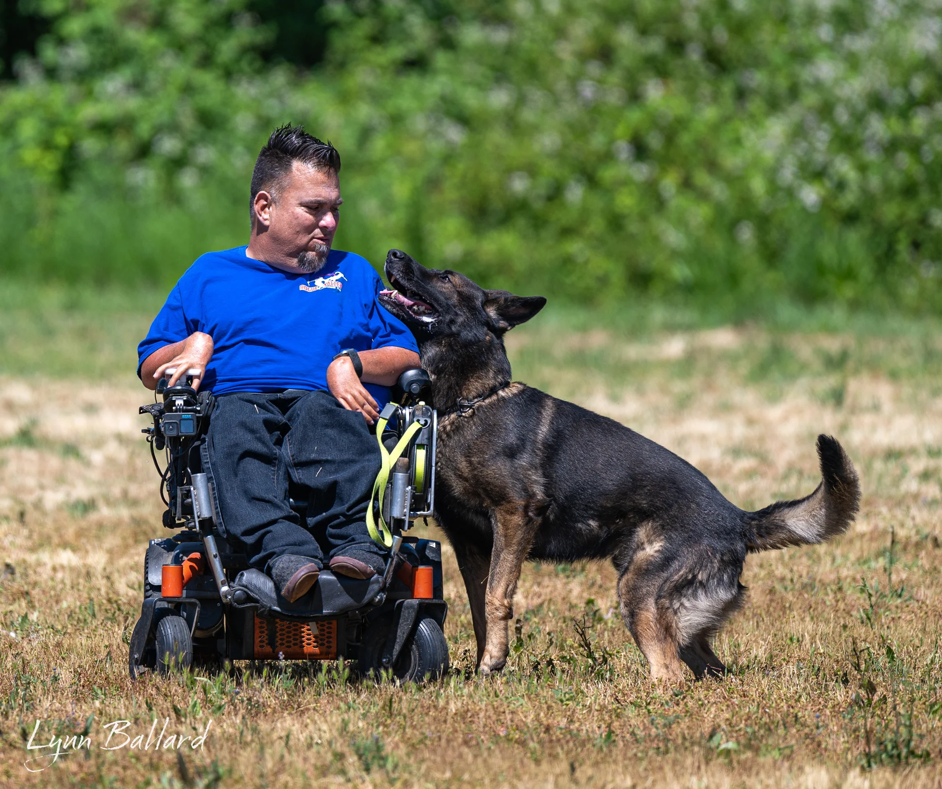 Jason Lake sharing a close bond with a working German Shepherd
