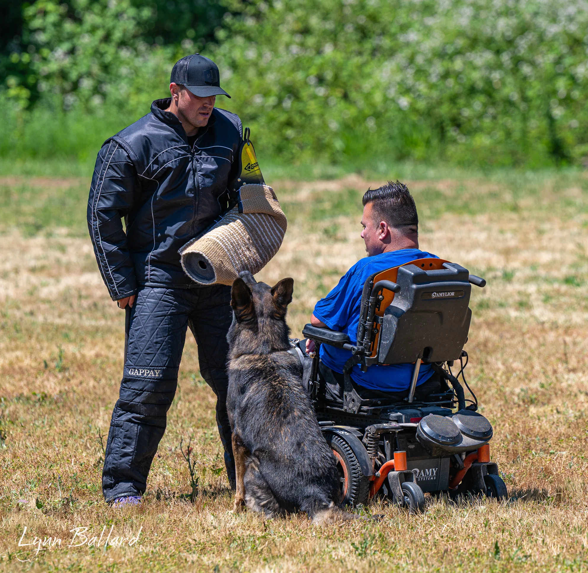 Jason Lake coaching grip development during protection-dog training