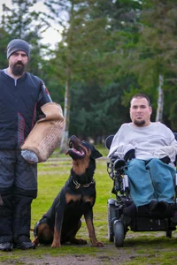Jason Lake helping a client with dog training